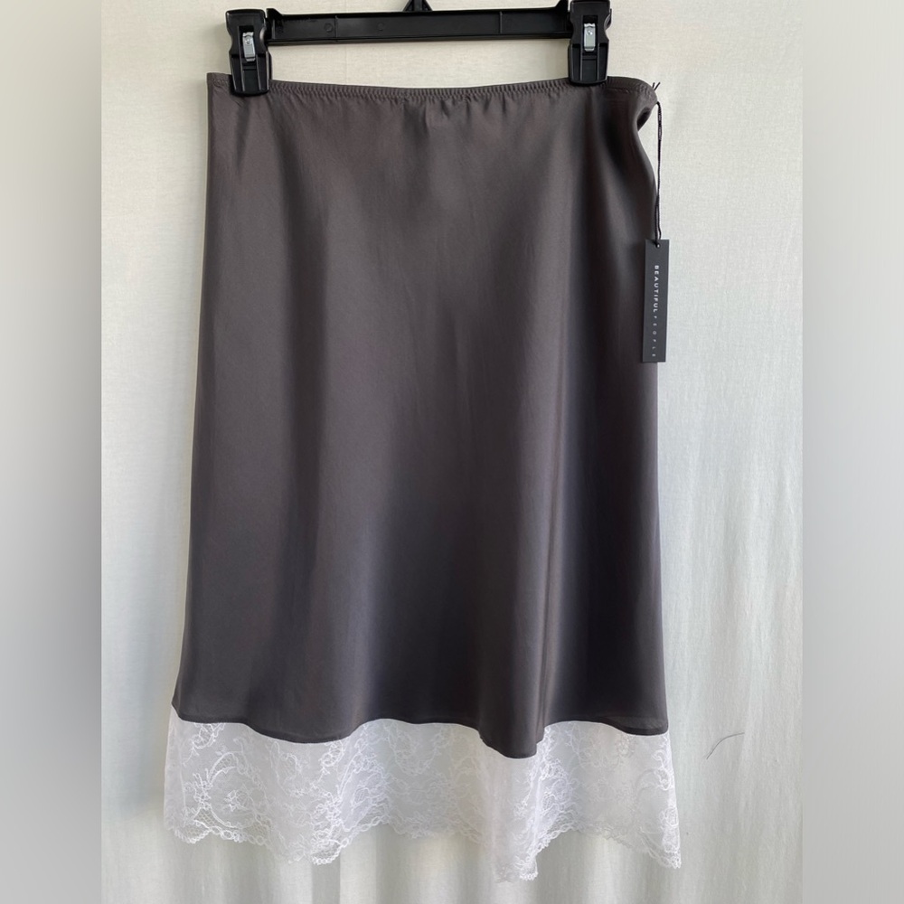 Grey natural silk midi skirt with a lace detail at the bottom.